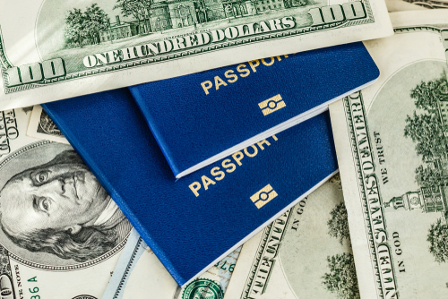 Passport with money to depict passport cost.